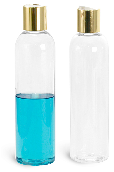 Clear PET Cosmo Round Bottles w/ Gold Disc Top Caps 