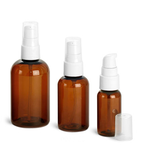 Amber PET Boston Round Bottles w/ White Treatment Pumps