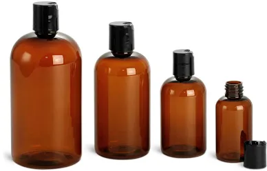 Amber PET Boston Round Bottles w/ Black Disc Top Caps