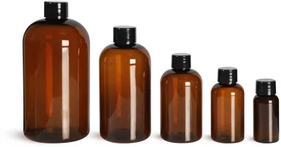 Amber PET Boston Round Bottles w/ Smooth Black Plastic Lined Caps