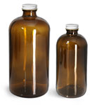 Amber Glass Boston Round Bottles w/ White Metal Plastisol Lined Caps
