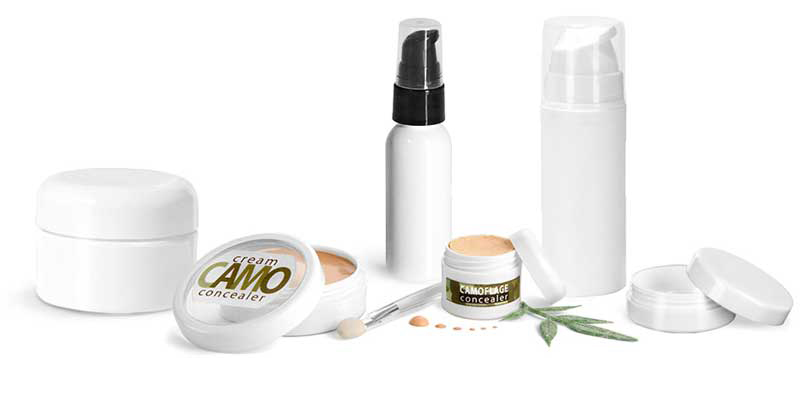 A set of bottles and tubes of cosmetics, jars for skin care with