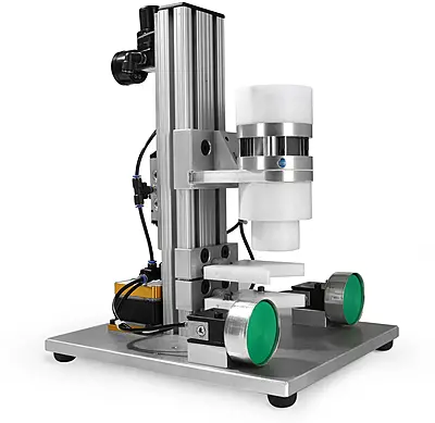 Universal Pneumatic Press Assembly For Child Resistant Sprayers